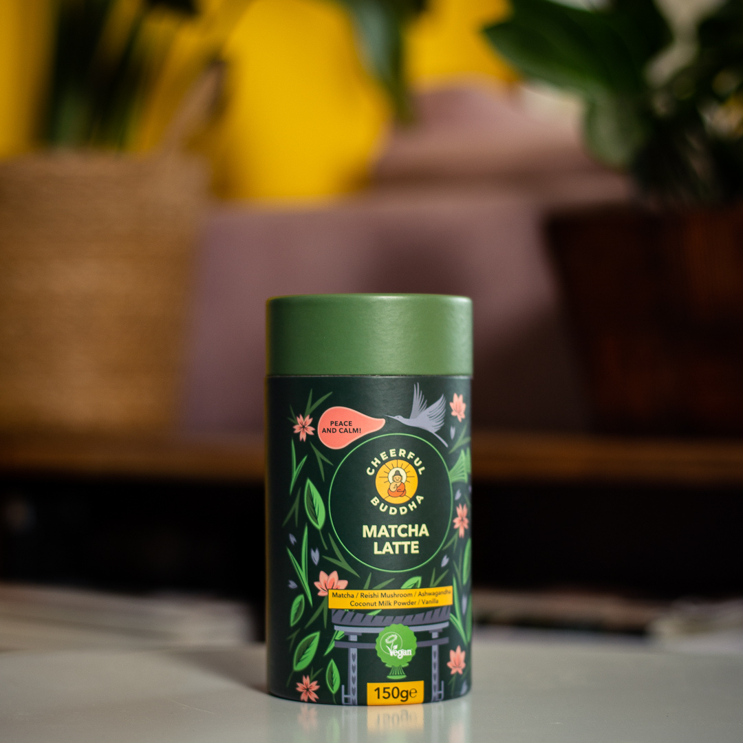 Matcha Latte tube on a table in a warm, sunny room