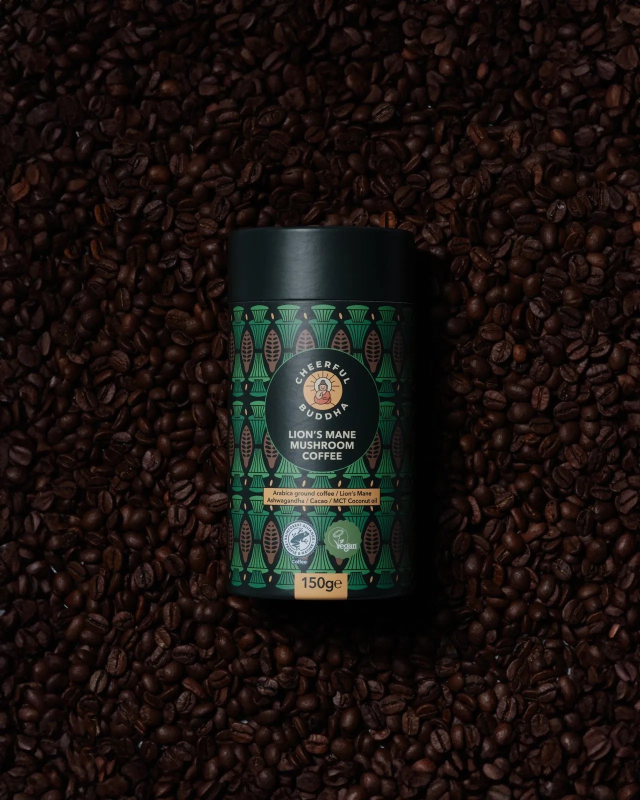 Lion's Mane Mushroom Coffee tube on a bed of coffee beans
